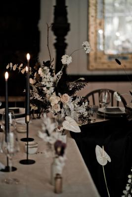 Monochrome wedding table flowers centrepieces