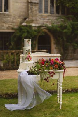 Painted flowers wedding cake Dorset