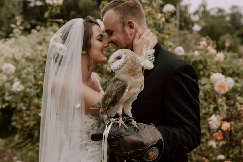Elegant English stately home wedding with owl ring bearer